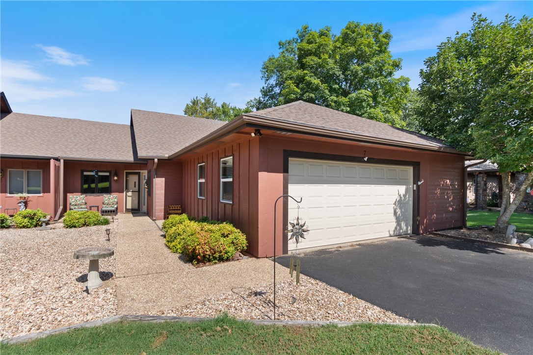 Located in the heart of NW Arkansas's playground, this remodeled single level home provides easy access to Hwy 71 and all that NW Arkansas has to offer. This home offers quick access to Lake Rayburn, It'll Bluff Out Mountain Bike Trail and more. Since 2021, a few of the upgrades include a new roof, new Pergo flooring, complete MB and Guest Bath remodels, new sliding glass doors to side and back deck areas, fully enclosed (attached) 2-car garage, new FP insert to include chimney and more. A complete list is included in the supplements. This home features 3-nice sized BR's and 2-full baths along with a Pantry in the Kitchen and separate Laundry room. The eat-in Kitchen is large enough for families to enjoy meals together plus has a separate Dining area for entertaining larger gatherings. The LR is HUGE and features a beautiful rock surround for the wood burning FP for those cold nights that are coming. Refrigerator, washer and dryer and window treatments to convey with acceptable offer. Furniture is negotiable.