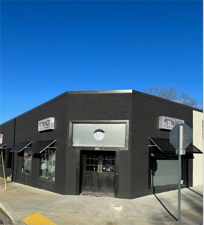 Fantastic location in downtown Fayetteville, building located just steps from the Fayetteville Square, on a corner lot. Many local business's, restaurants, shops and bars in the immediate area. Gross modified lease - tenant responsible for their own utilities. Current use of space landlord is willing to negotiate modification and updates to the space.