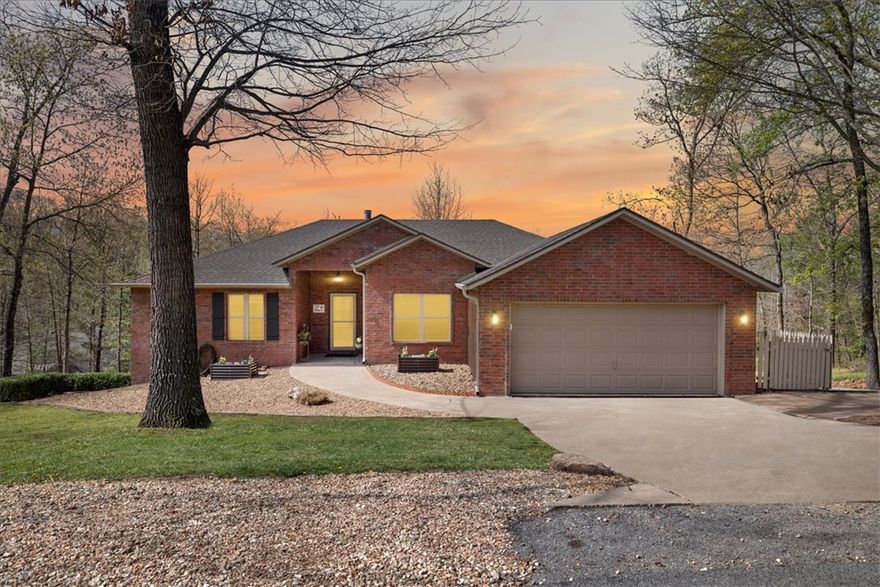 Live the Bella Vista lifestyle from one of the area’s most sought-after locations! This 3 Bed, 2 Bath home is situated just off the Greenway and Back 40 Trail system, this home offers direct access to world-class biking and outdoor adventure. You’re also just down the street from Blowing Springs Park, Metfield Rec Center, and a quick ride to the new OZ Trails Bike Park. This move-in ready brick home features fresh paint and carpet, making it clean, updated, and ready for its next owner. Inside, you’ll find a spacious primary suite with a sitting area, plus a stunning living room with cathedral ceilings, exposed wood beams, and a cozy fireplace. Step outside to enjoy peaceful nature views from the deck or covered patio which is perfect for relaxing after a day on the trails. Connected to city sewer and located within the Bentonville Schools system, this is Bella Vista living at its finest.