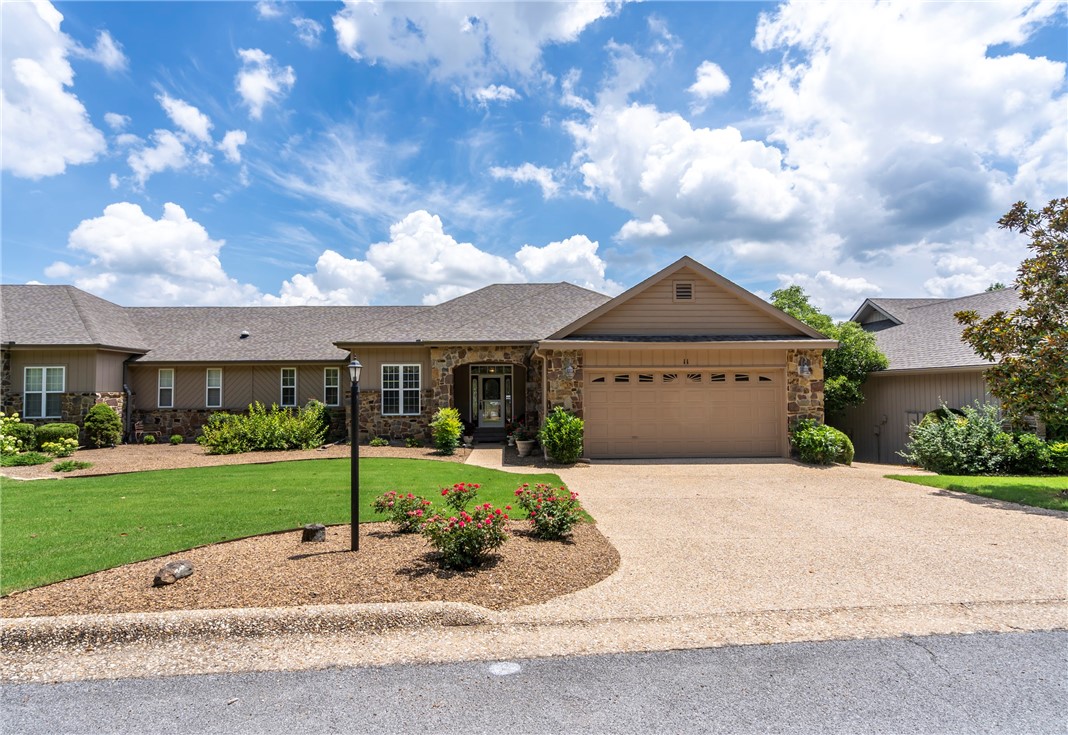Golf front home in a lovely community within walking distance or a short golf cart ride to Tanyard Creek Practice Center where you can utilize the driving range and state of the art golf simulators. Bella Vista Country Club is right down the course and 2 lakes, Avalon and Windsor are in close proximity. There is also a beautiful park and nature trail at the end of the street. You will love this convenient location - a true golfers paradise. Two large bedrooms, lovely open living/dining room plus an office are situated on the first floor. Lower level living features a large open den/game room, a beautiful bar, fireplace, two guest rooms and a luxe full bathroom. Large deck upstairs has a premium roll out cover, and downstairs features a fabulous patio. This home is an entertainers dream with lots of space inside and outside to relax and enjoy the sweeping views of the golf course. Lawn is maintained by the HOA, all the Bella Vista POA amenities are yours to enjoy and can be found on their website.