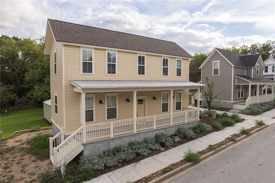 Make this beautiful and charming new home featuring a large covered front porch yours today! Upstairs bedrooms, each with its own bath, leaves first floor for family living and entertainment. Primary suite shower has a tile surround. Luxury vinyl plank throughout except for carpeted stairs. Green spaces, sidewalks and tree-lined streets for walking, allow neighborhood connections. Owner occupancy is required in this subdivision, however HOA will allow parents to purchase homes for their kids, or investors doing longer term (12 mo or more) rentals.