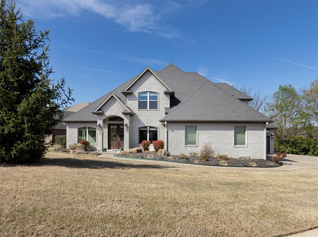 Quality custom home in sought after Stone Mountain tucked on a cul-de-sac. You're immediately greeted by stained concrete floors throughout main level upon opening your new front door. Off to the left is a dining room perfect for family dinners. Formal office off front door with ensuite and closet, so could be 5th bedroom. Open living room with wall of windows allows tons of natural light and a fireplace with custom wood wall. Kitchen features a slew of counter to ceiling cabinets and china cabinet next to refrigerator. Huge granite island in the middle, perfect for entertaining. Large dining nook takes you out to the huge covered back patio with outdoor fireplace. Primary bedroom is on main floor and has its own private covered back patio. Ensuite features HEATED floors, dual vanities, soaker tub, walk-in tile shower and large WIC. Large separate laundry room with mudroom. Upstairs adds two bedrooms sharing Jack and Jill bathroom and bedroom 4 has it's own bathroom. Bonus room could serve as media or playroom.
