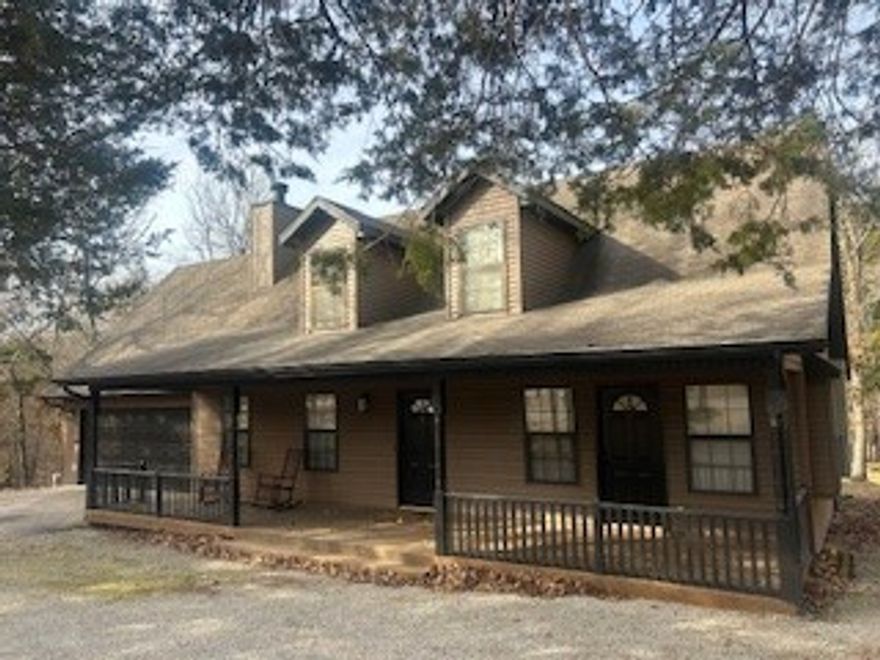 Welcome to this gorgeous home located on 1.16 acres!  This 2-story home is currently being used as an Airbnb and is selling Fully furnished!  Located at Holiday Island, you will find all that the beautiful Ozark Mountains offer.  Table Rock Lake, fishing, boating, tennis, golf and so much more!  The house is situated on a corner lot and has the rare luxury of being zoned residential or commercial!  This is a rare find at Holiday Island.  The 4/2 home features a wood burning fireplace, hardwood floors, wet bar, open spacious kitchen, tons of natural light, game room, walkin closets, jucuzzi tub and so much more!  The property that this well maintained home sits on is so spectacular, you won't want to leave!  Private trails and a hidden creek.  Haddock Creek, which feeds Table Rock Lake. Make this home your retirement haven or an excellent turn key investment!  This one is a must see!