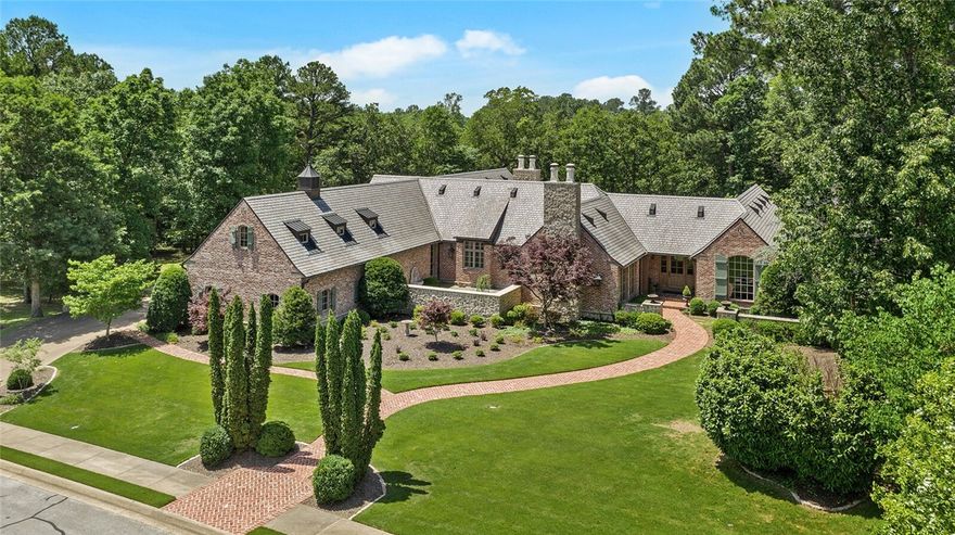 RARE OPPORTUNITY FOR THE MOST DISCERNING BUYER TO OWN THIS CAPTIVATING ONE LEVEL ESTATE OFFERING PREMIERE GOLF FRONT LOT!! Nestled in the prestigious Clear Creek neighborhood, arrive home to a picturesque, private, and personal French garden with exceptional views of the 12th hole of the Blessings Golf course. Every detail, both inside and outside, has been customized with a delicate blend of classic quality and sophisticated modern comfort. The ideal home for formal entertaining and intimate family gatherings, this 4947 SQ FT home has 3+ bedrooms, elegant reception, grand living and dining rooms that open to impeccable grounds, expansive veranda and resort style pool overlooking the golf course. Architectural elements feature masonry wood burning fireplaces, tongue and groove 9”wide old growth pine floors throughout, distressed beams, beautifully portioned spaces with 10’ ceilings to evoke elegant gracious living. Embrace the innate sense of tranquility and peace in this custom one-level home!