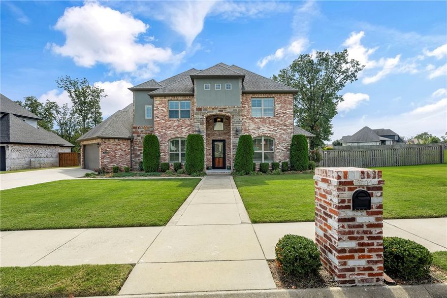 This amazing 4 bedroom/3.2 bath home is situated on over a half-acre lot and located in sought after Oak Tree Subdivision! With it’s reclaimed brick exterior and modern interior finishes, this is a special place to call home. The soaring entry leads into spacious living spaces including an office with custom wainscoting, formal dining room, large living room and spacious chef’s kitchen. The large island with granite counters and 48” gas range make meal prep and entertaining a breeze. With the primary and guest bedrooms on the main floor and two bedrooms with bonus/media room upstairs, there’s plenty of space for privacy after a long day. Spend cool autumn evenings out on the covered patio area featuring an outdoor kitchen, large seating area and custom wood burning fireplace. This backyard offers plenty of space for a private inground pool. Don’t miss the chance to see this amazing property!