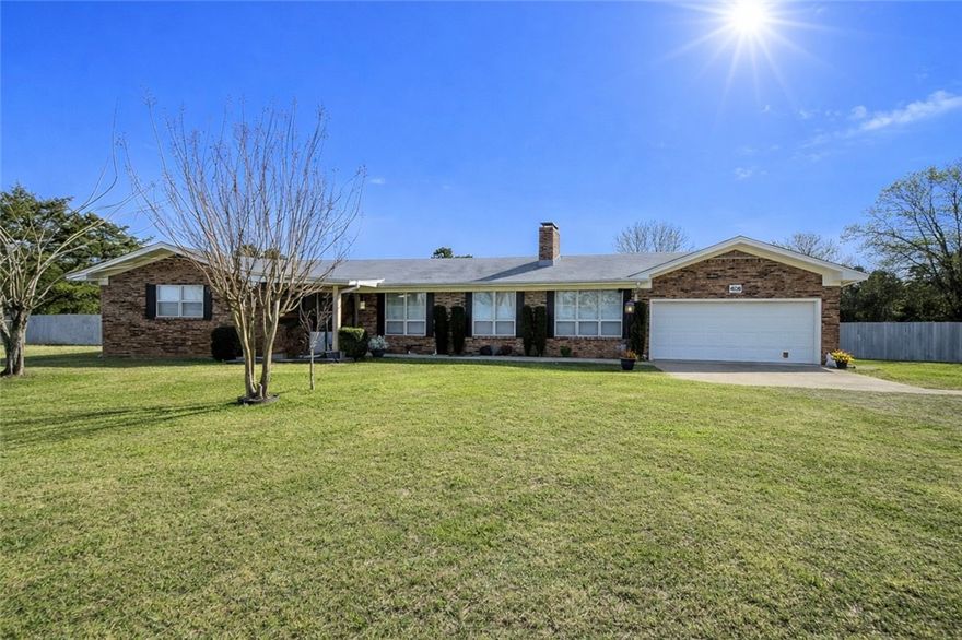 Set on 2.39 level acres atop Crow Mountain in the Pottsville School District, this meticulously maintained 2,200 sq ft traditional ranch offers stunning mountain views out front and breathtaking sunsets in the evenings. The home features two enormous bedrooms with wood flooring, ceiling fans, and double closets, plus a den off the kitchen that could easily function as a third bedroom. Enjoy a spacious living room with a cozy wood-burning fireplace, a well-appointed kitchen with updated appliances, breakfast bar, and a large dining area that opens to the expansive backyard. A two-car garage and a large covered metal carport provide ample parking and storage for lawn equipment or toys. Central heat and air is only a few years old. Mature trees, peaceful surroundings, and room to spread out make this Crow Mountain property a rare find.