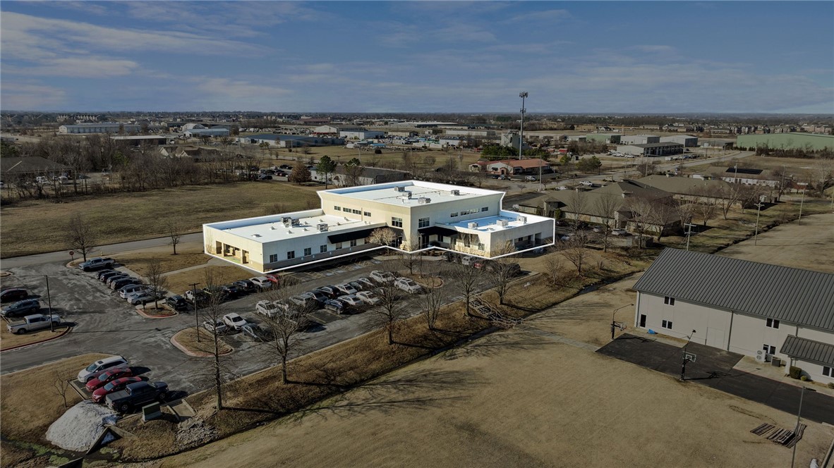 The Cognizant Building offers 30,225 SF of Class B office space for lease at $18/SF, making it an excellent choice for businesses seeking a professional yet cost-effective workspace. Built in 2006, this two-story, multi-tenant building features masonry construction, controlled access, a reception area, kitchen, and security system. Located in a suburban setting on 2.36 acres of land, it has a parking ratio of 4.11/1,000 SF with 125 surface spaces.
The property is conveniently positioned less than 2.5 miles from Walmart and Sam’s Club Home Offices, making it a strategic location for corporate operations. The building benefits from proximity to one of the nation’s top-ranked regions for quality of life. With a walk score of 44 and public transportation access nearby, this well-maintained office space is an attractive leasing opportunity for growing businesses.