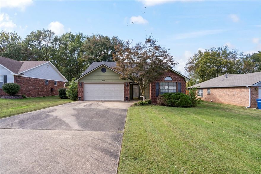 This charming 3-bed 2-bath home offers an inviting living space with a privacy fenced backyard tucked away on a cul-de-sac street. Step inside to find fresh updates throughout, including a new roof, carpet, paint, & privacy fence—all completed in 2025. The spacious living room features cathedral ceilings, crown molding, & a gas log fireplace, creating a warm & welcoming atmosphere. The split-bedroom layout ensures privacy, & the primary suite shines with a tray ceiling, walk-in closet, & private bath with double sinks & a walk-in shower. Enjoy the abundant cabinetry, built-ins, &  small storage room in the garage for extra organization. The kitchen comes equipped with a pantry & new microwave, plus the refrigerator, washer, & dryer all convey, making this home truly move-in ready. Relax outdoors on the deck or appreciate the convenience of gutters, a storm door, & a new thermostat. This home blends comfort, updates, & thoughtful details in a prime location close to schools & downtown Siloam Springs. Don’t miss out!