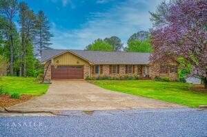 You will fall in love with this fully remodeled 5 bed/3 bath all brick home. This home is close to Harrison Schools and is perfect for a large family. A new roof, woodstove, back deck and many more updates. Call today and take a look!