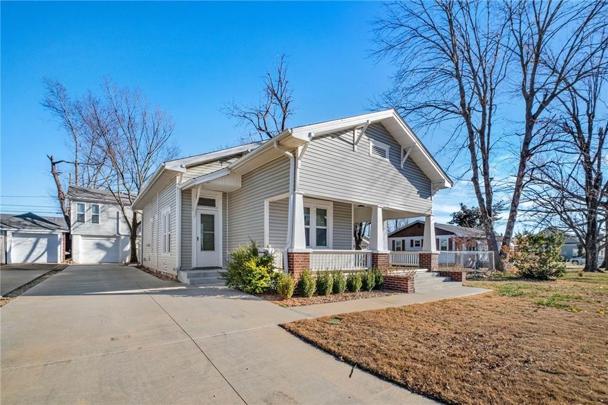 Downtown Rogers -- MAIN HOME plus a GUEST HOUSE (fully furnished) with separate entrance and parking right on the Bike Trail. So many possibilities. The Guest House is currently being operated as a successful 1 Bed 1 Bath AirBNB. Main Home (2 Bedroom 1 Bath) was built in 1940 and has been beautifully restored with a great mix of old and new. Beautiful original hardwood floors, remodeled bathroom and a new kitchen with custom cabinetry quartz countertops and professional quality gas range. New HVAC 2023, plumbing, electrical systems and windows for piece of mind. Outside, you'll find new concrete driveway, sidewalk back patio and steps, new roof (2024) and a new covered front porch.