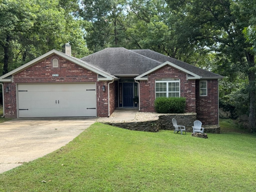 Tucked away in privacy and surrounded by nature, this charming and move-in-ready retreat offers the rare combination of space, serenity, and prime location right in the heart of Northwest Arkansas. Resting on an expansive 0.80-acre lot, this immaculate home is just minutes from Lowell, Springdale, and only a mile from Beaver Lake, Hickory Park, and the marinaāmaking it ideal for those who cherish the outdoors. Step inside to an open, light-filled floorplan featuring a cozy fireplace, pantry, storage, relaxing jetted tub, and an insulated garage. The large back deck is framed by mature trees, creating a peaceful setting for your morning coffee or evening sunsets. Whether youāre seeking privacy, comfort, or adventure, this home offers it allāwith shopping, dining, and recreation just moments away.