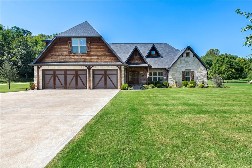 Sought after Cave Springs area home. This six year old custom built home, in a gated community, has so much to offer. 4 bedrooms 3.5 bathrooms on a split plan. Primary Suite is downstairs featuring a luxurious primary bathroom and ample walk-in closet space. Kitchen features leathered granite countertops and an immense island surrounded by too many cabinets to count and a huge walk-in pantry. Upstairs features additional bedrooms and a media room with a wet bar. Outdoor entertaining on the covered patio includes a built-in gas grill and a cozy wood fireplace on the patio for those beautiful upcoming fall evenings. You will be impressed with the space in the three car garage including a EV charging station built in already. The home even includes built in LED lighting outdoors which can be controlled remotely. This home was made for entertaining family and friends. Come see this home!!