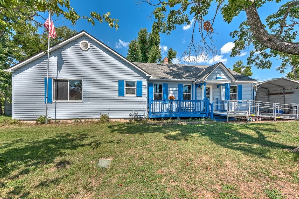 Prime development opportunity located just minutes from downtown Rogers. 3 bed, 2 bath, 1,508sf with workshop. Situated on almost half an acre, this older home offers incredible potential as a renovation project or redevelopment opportunity. The large parcel and unbeatable location make it ideal for investors, builders, or those looking to create their new home in a sought-after area.
