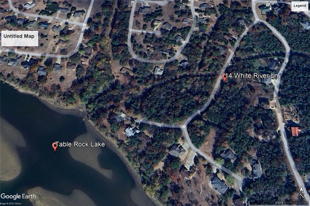 Ready to build your dream home? Quiet and gently wooded within a neighborhood, this lot offers the best of both worlds. Enjoy the amenities in Holiday Island like golf courses, a country club, swimming, tennis and a marina with a fishing dock or watch the local fauna from your front porch! Nearby Eureka Springs or Rogers offers great shopping and vibrant cultural hubs.