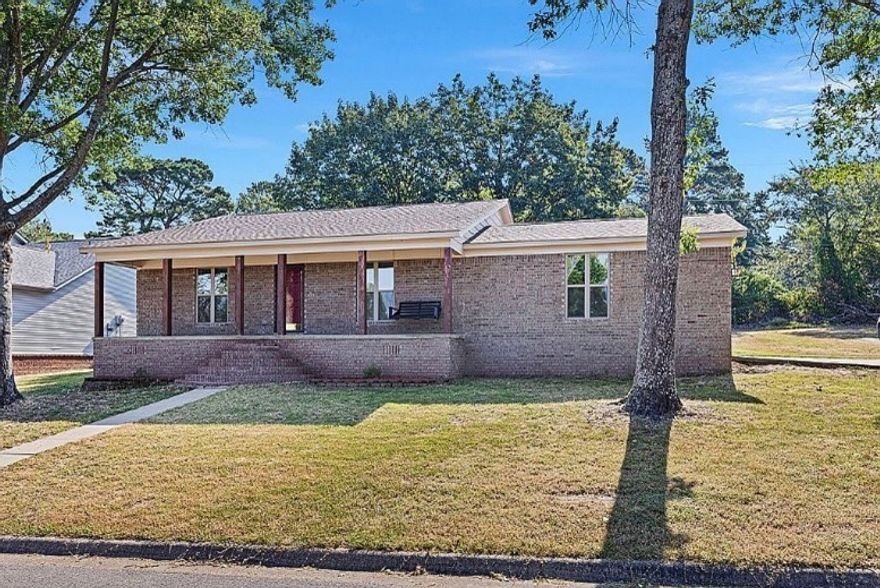 Thoughtfully updated 3 bedroom/2 bath, nearly 1,600 sqft home on a corner lot, high atop Marina Village subdivision. Enter a spacious living area w/vaulted ceiling & plenty of natural light. Just to the side is an unobstructed kitchen & dining area.  The large primary suite boasts an ensuite bathroom, large walk-in closet (including gun safe), and French doors opening to the patio. A metal storage building & lean to (w/a concrete pad) in the back yard keeps the garage from getting cluttered & puts yard tools right where they are needed.  Even the garage floor is a show stopper.  Take in the distant view of Lake Dardanelle while relaxing in the front porch swing.  Completing the alure of this property is its convenience (less than 2 miles) to Dardanelle State Park & Washburn Park, which has access to Bona Dea Trails.  Fresh interior/exterior paint in ’24 & ’25, new roof in ’22, new HVAC in ’19, new windows in ’18, new flooring in ’17.  Newer ceiling fans & light fixtures throughout. This goes on the “must see” list.