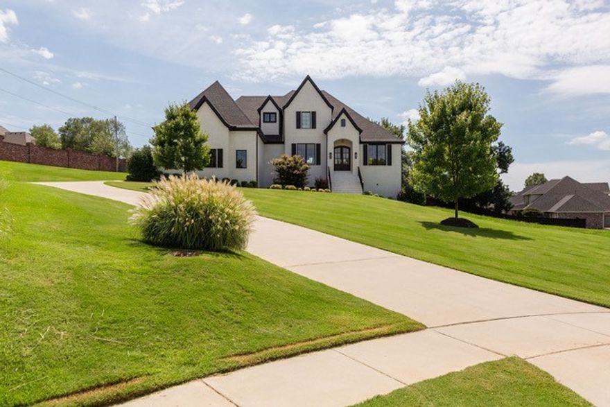 Fabulous, custom, one owner home in the highly sought-after, gated Heritage Hills.  Easy access to I-49 and all that NWA has to offer.  This home features 4 bedrooms/3.5 baths, a stunning gourmet chef’s kitchen, formal dining room, downstairs office, remote controlled privacy blinds on first floor, an abundance of storage throughout and main level MBR.  Upstairs game room and hidden media room, large bedrooms, sprinkler system, central vac, two gas fireplaces, hardwood floors, built-in wine fridge and so much more.