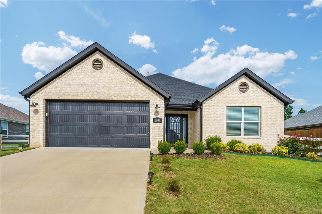 This charming home is located in just minutes from Downtown Rogers, shopping, dining, parks, and top rated schools. Featuring a spacious layout with plenty of natural light, this home offers comfort, functionality, and convenience. Whether you're relaxing in the cozy living area or enjoying a meal in the kitchen, you'll feel right at home. The backyard provides the perfect space for entertaining or unwinding after a long day. With quick access to I-49 and just a short drive from Pinnacle Hills, this home is ideal for commuters and anyone looking to be near the best of Northwest Arkansas. Don’t miss the chance to own a home in one of Rogers’ most accessible and desirable locations.