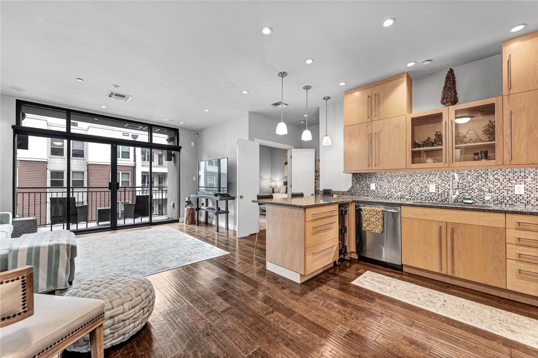 This Luxury condo located in the highly sought after Legacy Building is just a moment away from the beating heart of Fayetteville. You'll be just one block from Dickson, the Walton Arts Center, and the Razorback Greenway. Just a few more blocks away is the University of Arkansas and Razorback Stadiums. You'll be perfectly poised to enjoy everything Fayetteville has to offer from this spacious and open one bedroom condo. This unit features timeless decor, a gated underground parking space, and access to all building amenities (gym, lounge, etc.).