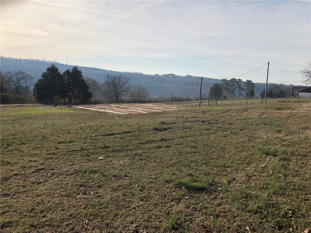 This is a beautiful property with amazing views. The existing pad was built for a 28 x 40 double wide mobile. There is public water, electric and an existing septic. The property is completely fenced in with a gate at the entrance. You have to see this property to believe the amazing views.