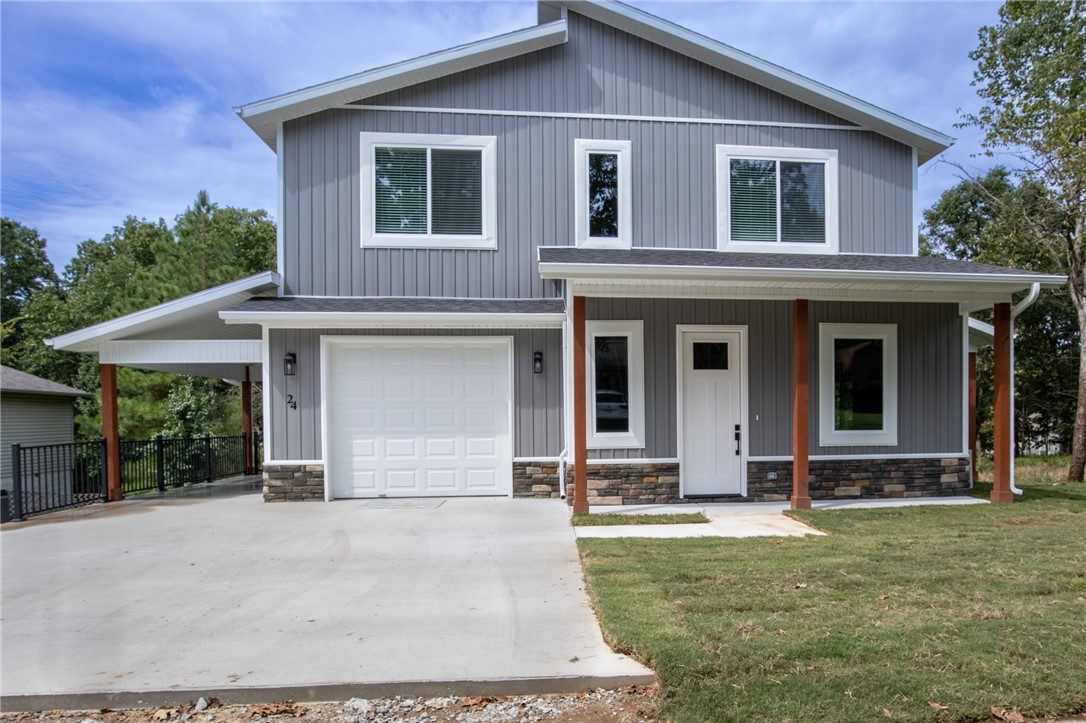 Welcome to your brand-new contemporary home, thoughtfully designed for comfort and style. This two-level residence features an open-concept main floor showcasing luxury vinyl plank flooring throughout, a chef inspired kitchen with granite countertops and a massive 12 ft peninsula with enough seating for 6 and a large open living room with 1/2 bath. Upstairs, you'll find a convenient laundry room and 2 spacious bedrooms each having there own luxury ensuite designed for both relaxation and functionality. Enjoy year-round comfort with Dual AC units, 1 for each level, energy-efficient construction, and plenty of natural light throughout. A one-stall garage with extra car port adds convenience, while the homes clean, modern design makes it standout. Extras to include wood blinds, extra storage closet in garage, large flat backyard, gutters and fully sodded yard.