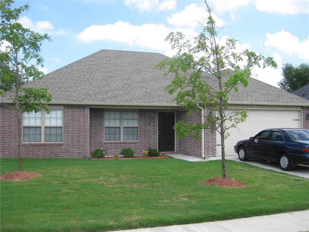 3 BR, 2 BA, 2 car garage, full-brick home, architectural shingles, large patio, large walk-in closet in MBR, hardwood in living room and hall, tile wet areas. In area of nice new homes. This home was built in 2014. One owner. Close to golf course.
