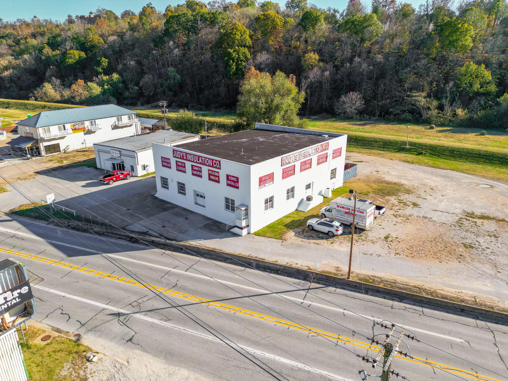 Excellent location!!!! Looking for a Vintage warehouse building to operate your business? Here it is! Complete with 2 stories, plenty of windows, loading and unloading docks, with large office space and foyer that is heated and cooled. Call today to take a look at this historic property!
