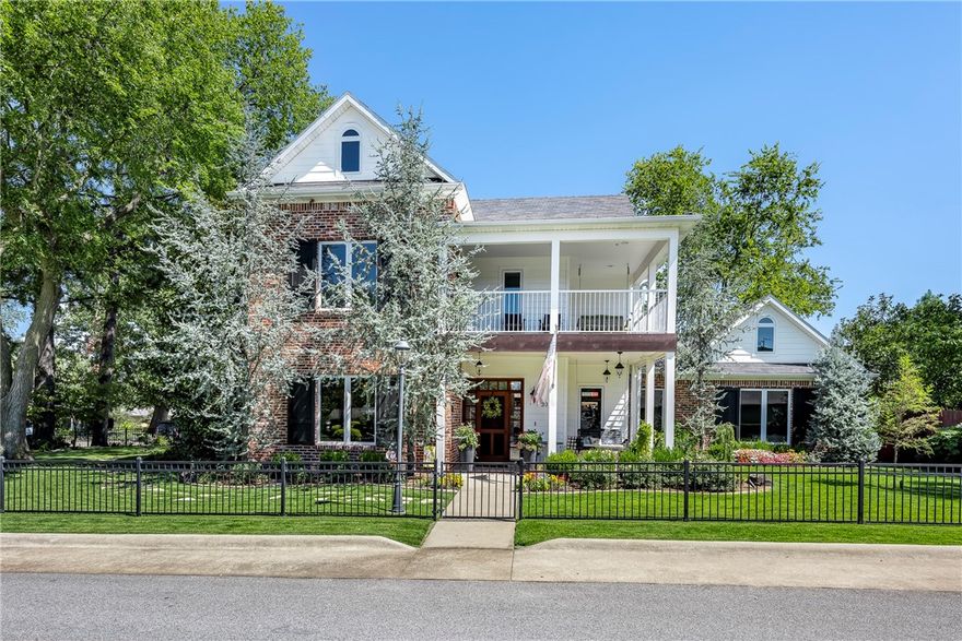 Charming home full of character, in a purely residential pocket of Downtown! Get the historic feel, with new home amenities. All hardwood floors, shiplap siding and brick interior walls are just some of the stylish features. Guest suite apartment, with private staircase, over the garage has many uses! The .23 acre lot is fully landscaped, lighted & irrigated. First floor primary suite, 3 bedrooms up, plus guest suite (5th bdrm), make for a very thoughtful and planned design. Enjoy the privacy on the front balcony with a swing, or invite friends over to gather on the back covered patio around the firepit. So many details you must see to appreciate! Custom home, built by a very reputible local builder.