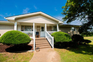 Attention Investors:Look at this newly remodeled 4 bedroom, 2 bath home, that features a 1bedroom efficiency apartment downstairs, as well as a 2 bedroom, 1 bath apartment out back. This property also has an additional climate-controlled building (Formerly a 2 car garage), that can be used for storage or transitioned to a 1 bedroom efficiency apartment. This is an overnight/short term rental entrepreneur's dream come true. The furnishings can also be purchased at an additional price.