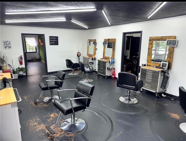 Unbeatable Location!!! An incredible opportunity to operate your business in the heart of the city, with high visibility! Previously used as a salon but has potential for so many opportunities. Location is everything with this property. Ample parking. It sits right off of Walton Blvd. next to the Walmart To Go, across the street from Orange Theory, and close to many other businesses and restaurants. Building has a new roof, new HVAC, and new flooring throughout. Schedule a showing today and come see the potential to make this the home for your next business! Billboard not included.
