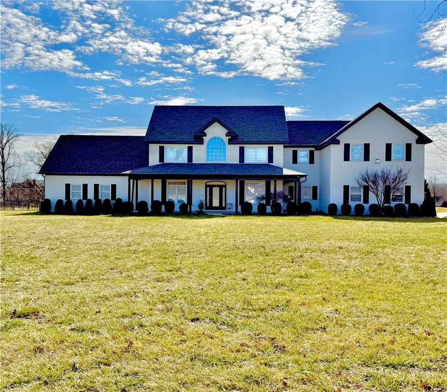 Experience resort-style living in this stunning estate! Since 2023, this property has been elevated with high-end upgrades designed for ultimate entertaining. The backyard is now a private oasis featuring a newly added outdoor kitchen housed under a grand detached covered pavilion, perfectly positioned next to the sparkling pool.

Enjoy the outdoors year-round in the new 3-season room, or relax on the upgraded balcony and porch, now featuring premium composite decking for a beautiful, maintenance-free finish.

Inside, the home shines with a gourmet kitchen, 3 cozy fireplaces, and a primary retreat on the main level. The upper floor is an entertainer’s dream with a massive theater/game room and wet bar. Situated on nearly 3 lush acres with a 4-car garage and a dedicated dog wash station, this home blends grand architectural scale with modern luxury. Don't miss the chance to own this turnkey masterpiece—schedule your private tour today! ** Pool Table in game room & Outdoor Tv under Pavilion may Convey**