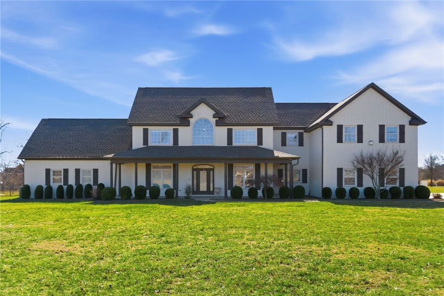 Experience resort-style living in this stunning estate! Since 2023, this property has been elevated with high-end upgrades designed for ultimate entertaining. The backyard is now a private oasis featuring a newly added outdoor kitchen housed under a grand detached covered pavilion, perfectly positioned next to the pool.

Enjoy the outdoors year-round in the new 3-season room, or relax on the upgraded balcony and porch, now featuring premium composite decking for a beautiful, maintenance-free finish.

Inside, the home shines with a gourmet kitchen, 3 cozy fireplaces, and a primary retreat on the main level. The upper floor is an entertainer’s dream with a massive theater/game room and wet bar. Situated on nearly 3 lush acres with a 4-car garage and a dedicated dog wash station, this home blends grand architectural scale with modern luxury. ** Pool Table in game room & Outdoor Tv under Pavilion may Convey**Preferred Lender Incentives Available!