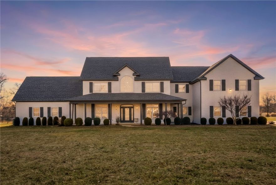 Experience resort-style living in this stunning estate! Since 2023, this property has been elevated with high-end upgrades designed for ultimate entertaining. The backyard is now a private oasis featuring a newly added outdoor kitchen housed under a grand detached covered pavilion, perfectly positioned next to the pool.

Enjoy the outdoors year-round in the new 3-season room, or relax on the upgraded balcony and porch, now featuring premium composite decking for a beautiful, maintenance-free finish.

Inside, the home shines with a gourmet kitchen, 3 cozy fireplaces, and a primary retreat on the main level. The upper floor is an entertainer’s dream with a massive theater/game room and wet bar. Situated on nearly 3 lush acres with a 4-car garage and a dedicated dog wash station, this home blends grand architectural scale with modern luxury. ** Pool Table in game room & Outdoor Tv under Pavilion may Convey**Preferred Lender Incentives Available!