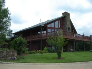 Amazing property with nice blend of woods and pasture. Creek, Springs, Ponds, Small lake with boat dock stocked with fish. Beautiful home. 2200 sq ft garage/shop. Numerous outbuildings. Abundant wildlife with deer stands and food plots.