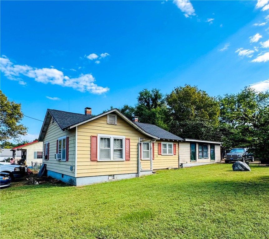 This listing includes Two Homes + Outbuilding- Seller wants to sell as a package deal. This property is ideal for multi-generational living or as an investment property with two rental homes. The package includes two houses on three lots, including a small barn. All of this in the heart of Berryville and within walking distance to schools and businesses.
Home 1 (built 1972): 302 E College St. 1500+ sq ft 3 bedrooms, 2 baths, roof less than a year old with new decking. Home currently has gas heat. Features a bonus space that could be utilized as additional formal living area or office once finished. Seller is also leaving brand-new replacement windows (to be installed or left with buyer). Also a new never used, central heat unit has already been placed in the attic—installed but not yet hooked up.
Home 2 (built 1991): 305 Shaver St. 900sqft 2 bedrooms, 1 bath with a metal roof less than 5 years old—perfect for extended family, guests, or rental income. Plenty of space and opportunity to create value.