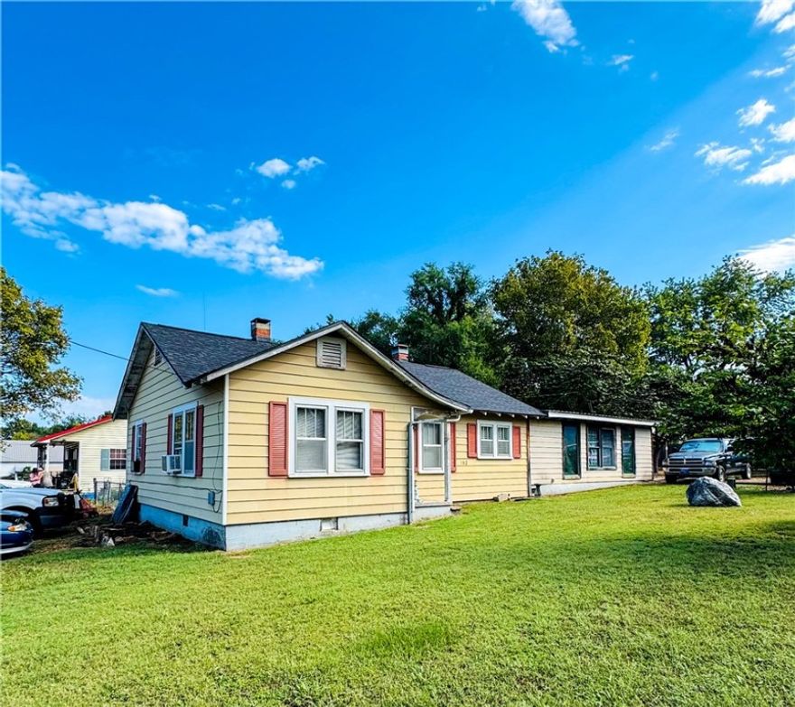 This listing includes Two Homes + Outbuilding- Seller wants to sell as a package deal. This property is ideal for multi-generational living or as an investment property with two rental homes. The package includes two houses on three lots, including a small barn.  All of this in the heart of Berryville and within walking distance to schools and businesses. 

Home 1 (built 1972): 302 E College St. 1500+ sq ft 3 bedrooms, 2 baths, roof less than a year old with new decking. Home currently has gas heat. Features a bonus space that could be utilized as additional formal living area or office once finished. Seller is also leaving brand-new replacement windows (to be installed or left with buyer). Also a new never used, central heat unit has already been placed in the attic—installed but not yet hooked up.

Home 2 (built 1991): 305 Shaver St. 900sqft  2 bedrooms, 1 bath with a metal roof less than 5 years old—perfect for extended family, guests, or rental income. Plenty of space and opportunity to create value.