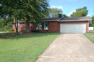 Located near Bull Shoals Lake this 2bed 1bath brick home has a lot to offer. Large living room with wood burning fireplace, spacious kitchen, great floorplan, useable heated and cooled basement for entertaining or possible 3rd and 4th bedroom, relaxing covered back patio to enjoy your morning coffee and more! All of this is just a short drive to boat ramps and public use area on Bull Shoals Lake! Over 2000 sq ft of heated and cooled space.