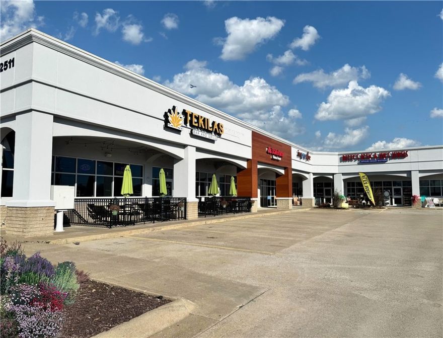 2nd Street Shoppes is a 15,008 square-foot retail center located at the northeast corner of Second Street and Highway 102 (Hudson Road) in Rogers, Arkansas. The site is less than four miles east of Interstate 49, the main commercial corridor of Northwest Arkansas, less than two miles north of Historic Downtown Rogers and short drive to Beaver Lake, a popular vacation destination in the Ozark Mountains. In addition, the property is near new Kum & Go and Storage World development projects and is well-near the new America’s CarMart corporate offices and Rogers Executive Airport.
• 5,800 square feet of retail space
• Located in a highly-trafficked area with stop light
• Well lit parking with abundant space
• Open concept retail floor space
• Adjacent to Seven Brew