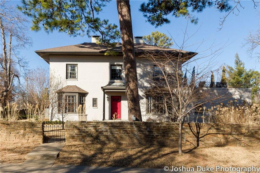 Casual Elegance in Wilson Park. Historic home was completely renovated in 2013. Tim Janacek was the contractor, Dale Trice did the interior design and Daniel Keeley did the exterior design. One of a kind home located on huge corner lot in the heart of Fayetteville. It includes 2 patios, swimming pool, 3 fireplaces, large sunroom, basement and a deck connected to the master bedroom with a view of Old Main. You can read more about this unique home by viewing http://athomearkansas.com/article/next-chapter.
