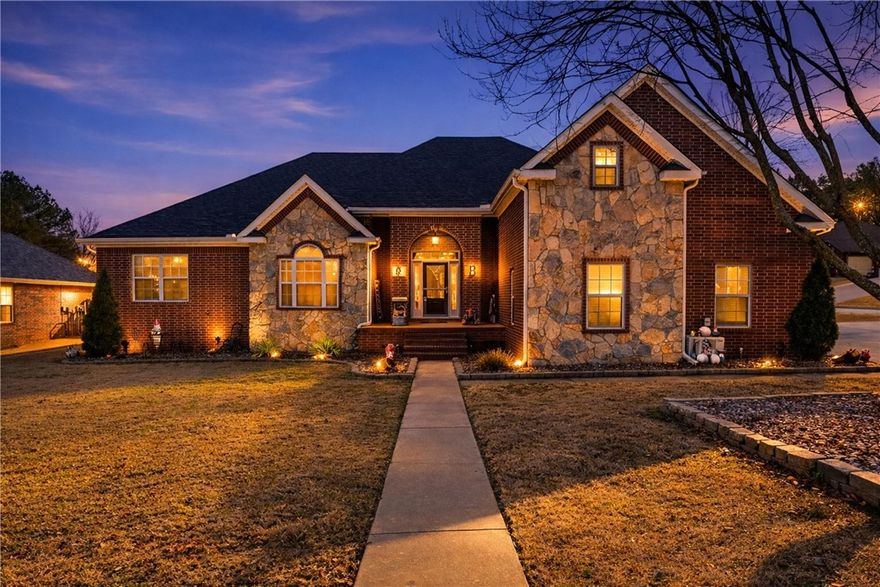 This stunning corner lot home in the Pinewoods Subdivision is a true Showstopper! With beautiful brick and stone exterior finishes. Tons of upgrades (2021-2022) including HVAC system, fresh paint, quartz countertops (kitchen and half bath), appliances, all bathrooms, carpet and an inground saltwater swimming pool, hot tub, Govee lights and Roof. House is spacious and grand with 14' ceilings in living-room with gas log fireplace. Office space leading into the primary suite with another exercise/reading/nursery, etc. 2nd fireplace in primary bedroom which also includes his/her walk-in closets, his/her vanities, large, jetted tub and walk-in shower. Walking distance to the community pool, basketball court and catch and release pond with a beautiful park like setting! This subdivision is well established with mature trees throughout creating the perfect blend of natural beauty and community charm. This home is absolutely a hidden gem close to schools, shopping and entertainment!