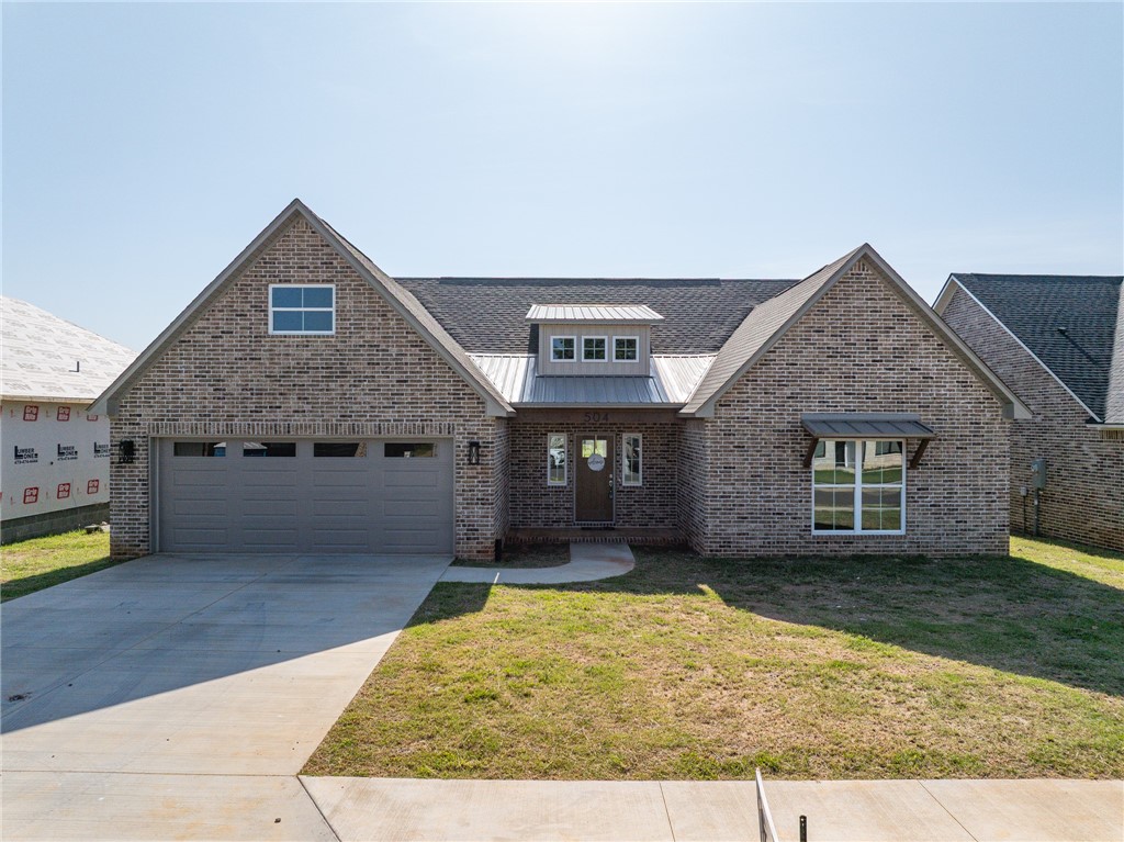 Experience Living in Magnolias at The Ranch. Step into a life of style, comfort, & smart functionality in this stunning new construction by Frontier Homesādesigned not just to impress, but to live in. This home blends design with luxury. Soaring ceilings, custom built-ins, a dramatic floor-to-ceiling fireplace set the tone for cozy evenings. At the heart of the home is a chef-inspired kitchen with quartz countertops, Energy Star-rated appliances, & a large walk-in pantry. The primary suite is a peaceful retreat, featuring a custom-tiled walk-in shower, soaking tub, dual vanities, & a spacious closet that connects to a laundry room with built-in hampers & smart storage. Additional highlights include Pergo flooring throughout, tilt-in Energy Star windows, a water recirculation system, & a 220V garage outlet. The home is also solar-ready and includes a holiday lighting outlet & switch. Enjoy mornings on the spacious covered patio. Whether you're hosting or unwinding, this home invites you to love where you live.
