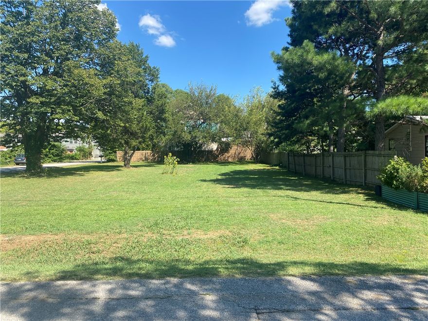 Beautiful lot with so many options! Located only steps away from the Razorback greenway in the heart of Fayetteville. It's the perfect property to build your single family "forever" home on with a level surface and all city utilities at the street. Being zoned RSF4, this property also has several other development options as well. A buyer would have the ability to build up to two additional accessory dwellings on the parcel to be used for rental income (3 total). Only 1 mile from downtown Fayetteville and only 2 miles from Washington Regional Hospital. The large mature tree are a rarity and perfect for a future tree house! The neighborhood is fast appreciating and it's got good close access to I49. The large lot (.27 acre) is easily big enough for a swimming pool and so much more. Give me a call today!
