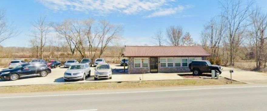 Location, Location, Location!!
Major road frontage with great traffic count. 
864 SF office space with an all concrete lot, no asphalt. 
*New Roof
Currently being used as a dealership.