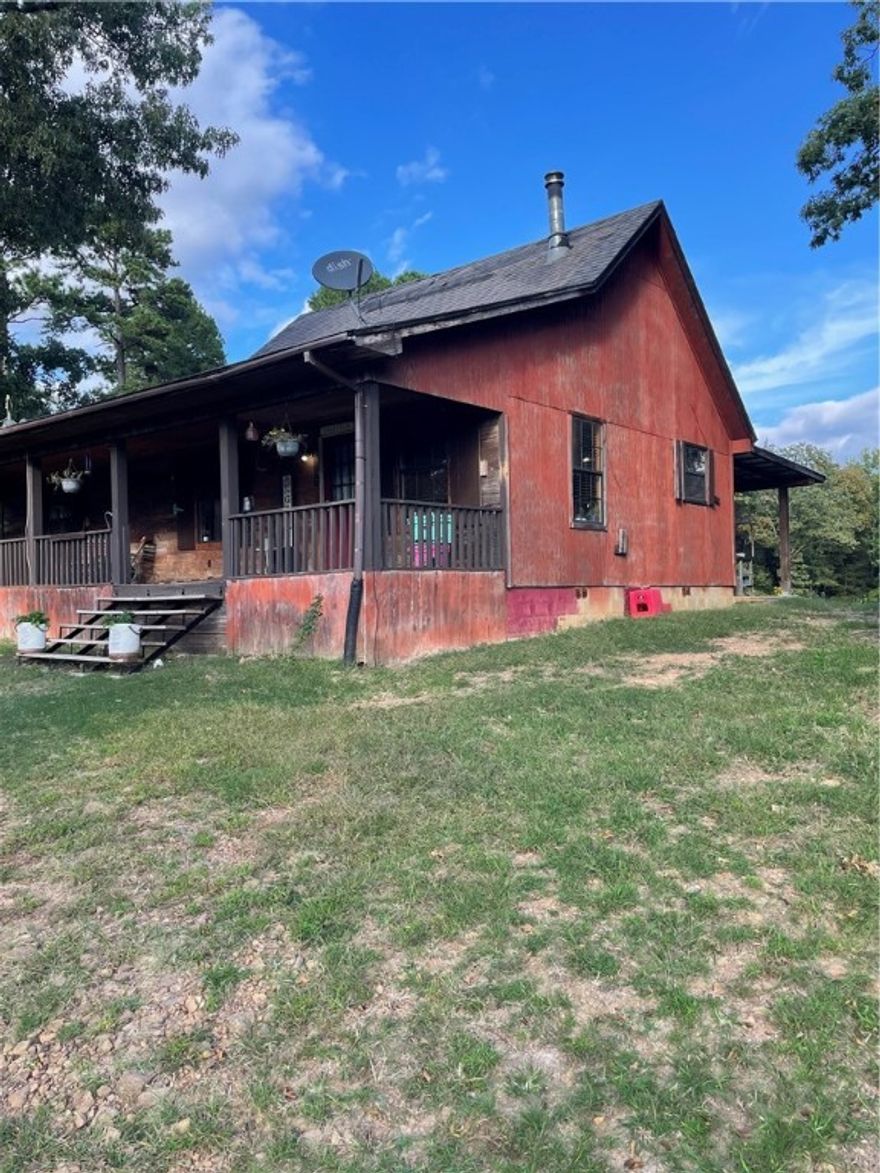 3 bedrooms 1 bath cabin with 17.9 acres that fenced and cross fenced. This home offers walk in closets in every bedroom, a barn with 2 stalls (Could be 3), chicken coop, small pole barn, in a peaceful setting. This property is only around the corner from Lake Ludwig, close to the national forest, and close to bike riding trails and close to side by side trails.