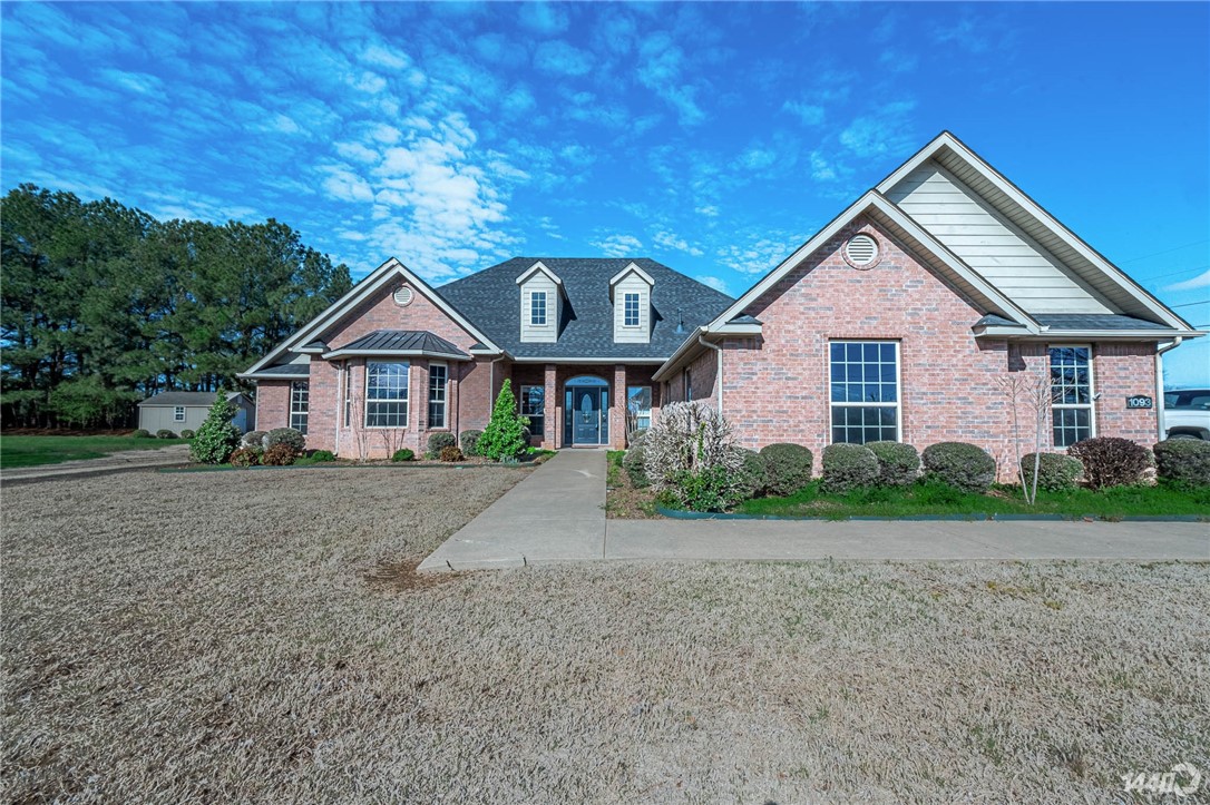 Back on market! 1093 Barrington is your opportunity to own a ~2500 square foot beauty on 1.87 acres, but right in the heart of Northwest Arkansas. The home features a grand living/dining area, an office, a formal dining room, and a nice western wing with all three bedrooms, including a beautiful main bedroom that is often flooded with natural light from the western-facing windows. Walk-in closets, a three-car garage, ample parking space for your boat or RV, and an enclosed back porch with ceiling fans with views of your landscaped lot. With an updated kitchen featuring custom cabinets, and an office that could double as your fourth bedroom, there is certainly room to grow into. This is a golden opportunity you DO NOT want to miss.