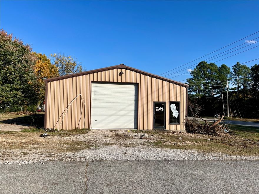 RARE FIND FOR THE PRICE!! HIGHWAY FRONTAGE & LARGE SHOP. Only 4 miles from I49. Charming home with good bones & large shop on .55 acres with Wedington/Hwy 16 frontage. What truly sets this property apart is the location & the massive 36x50 detached shop with electric, separate office space with entrance, 2 rollup doors, 12 ft side walls and 6" concrete floor. Ideal for hobbyists, small business owners or additional storage. The home does need some TLC, making it a perfect canvas for your personal touch or renovation vision. Whether you are an investor, DIY enthusiast or looking for a diamond in the rough, this property offers incredible potential and value. Don't miss your chance to own this unique property with both residential and workshop space.
