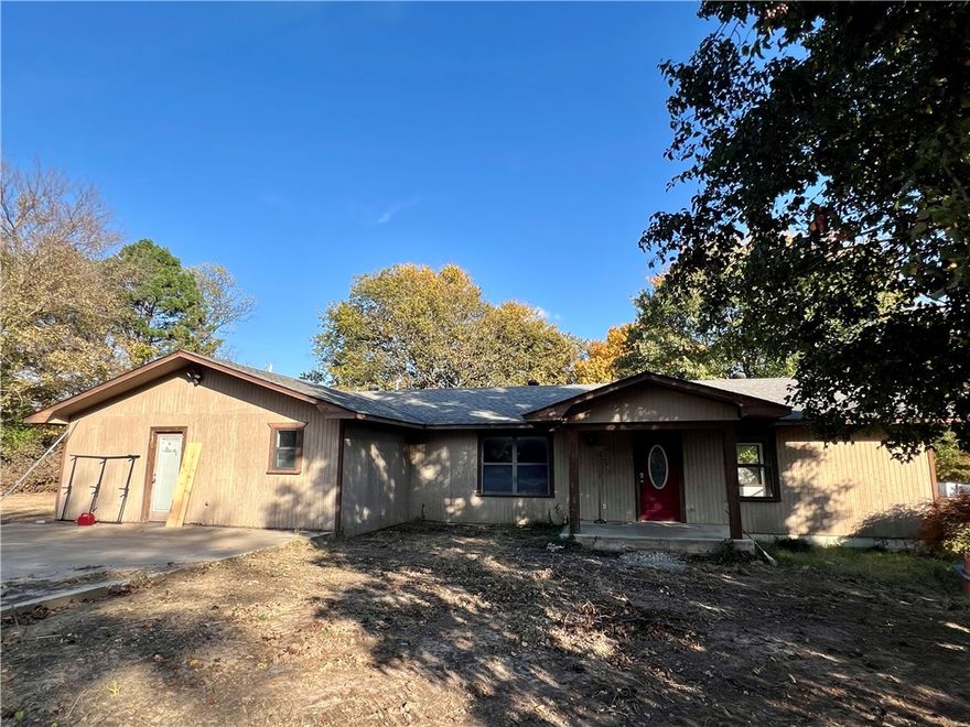 Charming home with good bones and large shop on .55 acres with Hwy 16 frontage. Only 4 miles from I49. The home features a cozy layout, mature landscaping, generous yard, perfect for gardening, entertaining or future expansion. What truly sets this property apart is the location and the massive 36x50 detached shop with electric, separate office space with entrance, 2 rollup doors and 12 ft side walls. Ideal for hobbyists, small business owners or additional storage. The home does need some TLC, making it a perfect canvas for your personal touch or renovation vision. Whether you are an investor, DIY enthusiast or looking for a diamond in the rough, this property offers incredible potential and value. Don't miss your chance to own this unique property with both residential and workshop space.