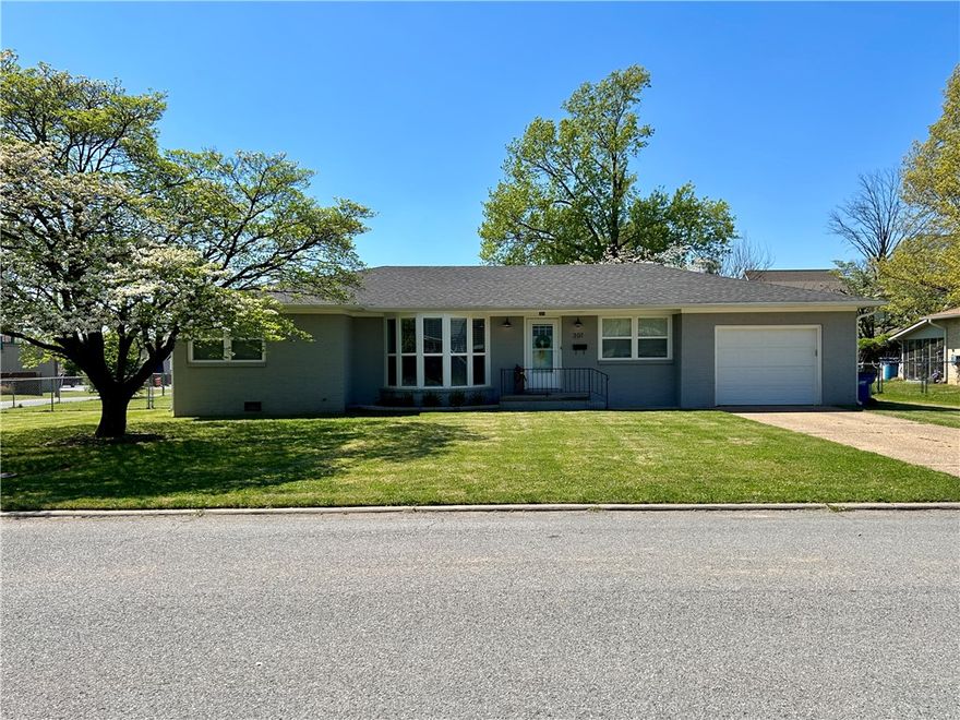 Remodeled 3 bed, 2 bath, 1 car garage home conveniently located 0.8 miles from Downtown Bentonville & 1.3 miles from the Coler Mountain Bike Preserve. Modern color palette. Granite counters in kitchen & guest bath. Luxury vinyl plank floors in living spaces; tile floors in kitchen, baths & laundry room; carpeted bedrooms. 2” Faux wood blinds. Large fenced backyard & oversized corner lot. Rent includes refrigerator, washer & dryer. No smoking anywhere on property. No parking in the street after 8pm. No basketball goals allowed in front of home. No boats, trailers, RV's or large work trucks over 3 tons may be parked on the property. No above ground swimming pools. Tenant responsible for utilities, lawn maintenance, renters insurance, & pest control. Pets negotiable.