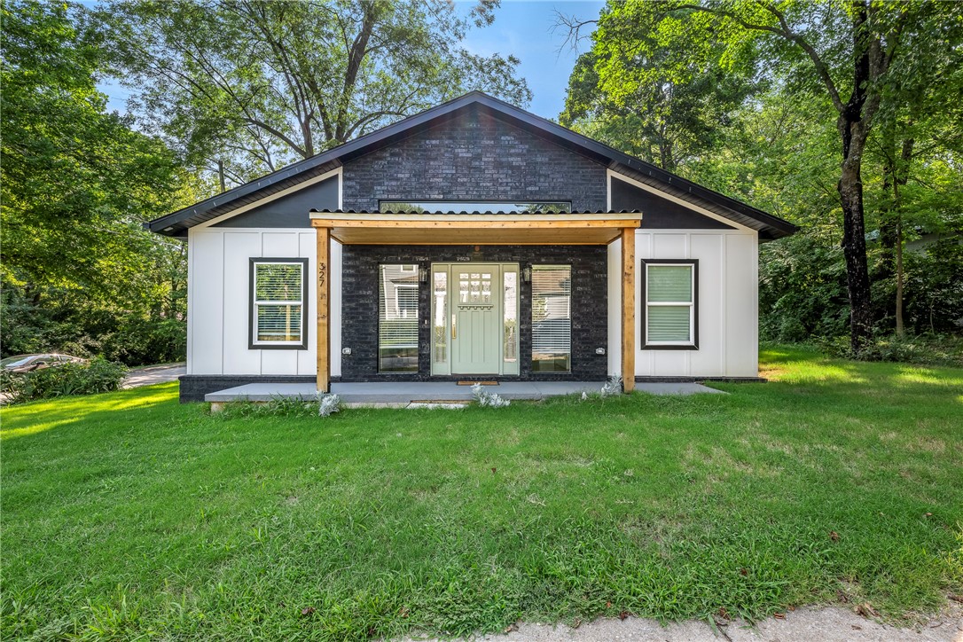 Welcome home to this beautiful, fully furnished, Fayetteville charmer! This home was completed in 2023 and boasts reclaimed hardwood flooring, custom cabinets in kitchen, large walk-in primary closet beautiful tiling throughout, a covered deck on the back of home, and so much more! Located in the heart of Fayetteville, it's less than 2 miles from UofA and just minutes to Fayetteville Square. With the home fully furnished and fully stocked, it's ready for move in on day. Home sits on a double lot that a second home could be built on.