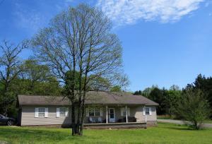 An open floor plan featuring a vaulted ceiling provides plenty of room for the whole family to spread out. Built in shelving gives you a great opportunity to show off your style! Enclosed garage can be used as a home gym/hobby room but could easily be converted back to a garage. This maintenance free home sits on 1.18 acres leaving you plenty of room to add a shop or even a detached garage! New HVAC and hot water heater were installed in 2019. You will enjoy the feeling of country living without being too far from town! Center Valley school is just 2.5 miles away!