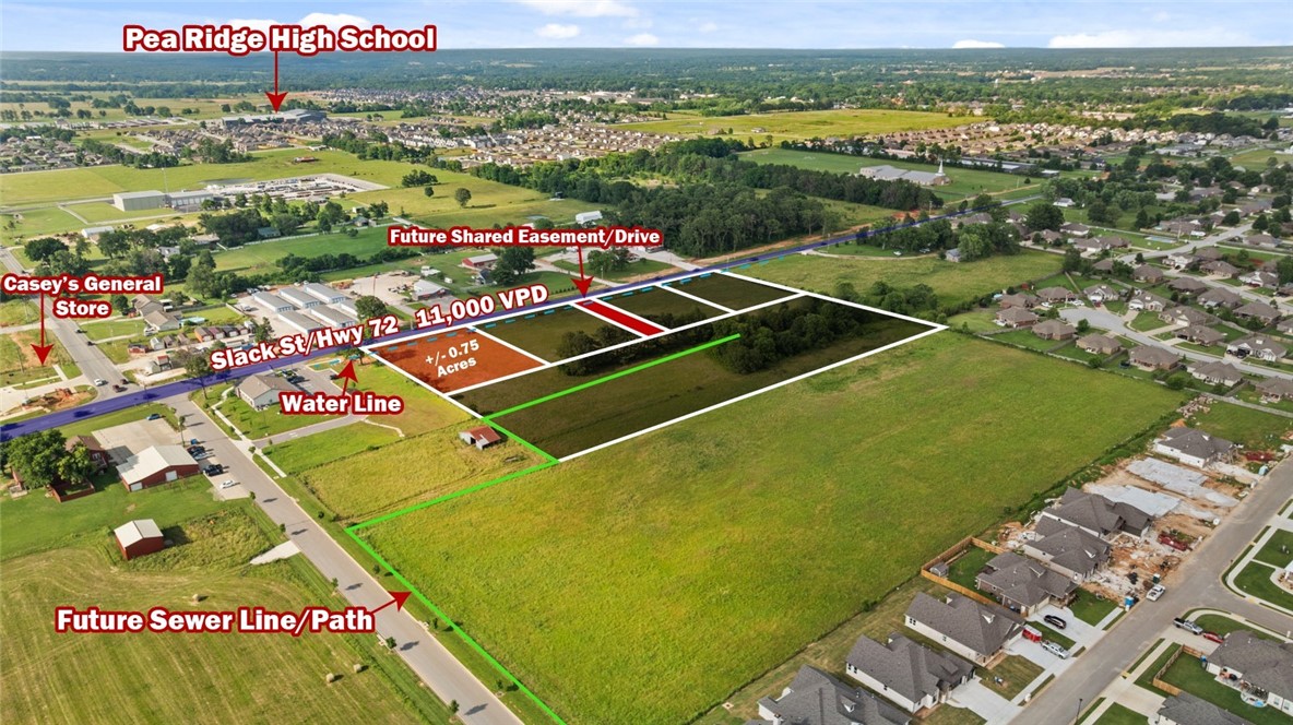 +/- 0.75 acres of level, cleared land right off Slack St/Hwy 72 in Pea Ridge, with approx. 135' of road frontage and around 10,000 VPD for high visibility. Zoned C-1 Neighborhood Commercial, this prime location is ideal for a bank, medical or general office building, retail space, or restaurant. Situated near the upcoming Casey's General Store, this property is in a thriving area. Pea Ridge is one of Northwest Arkansas' fastest growing cities, with over 400 building permits issued in 2023, surpassing even Springdale, AR!